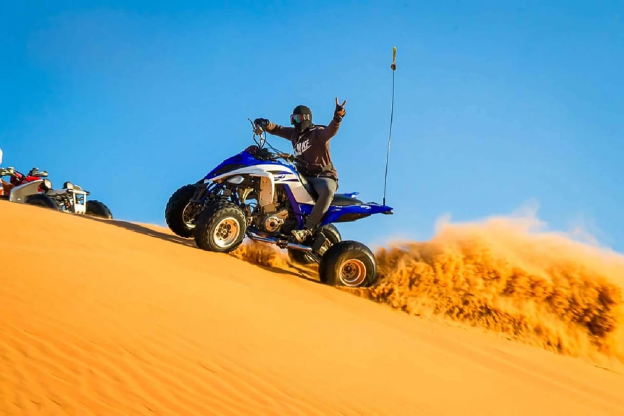 Quad biking is any other interesting journey to strive for on a morning desert safari trip Dubai.