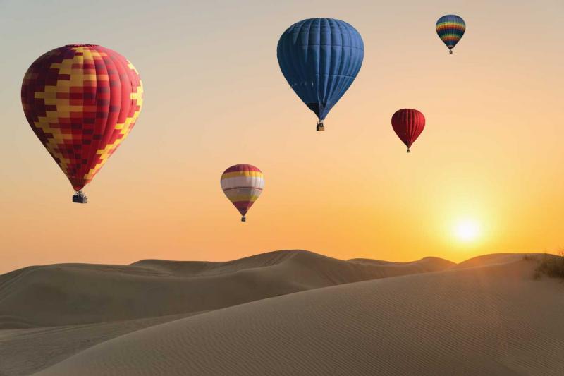 Sunrise hot balloon ride Dubai in desert