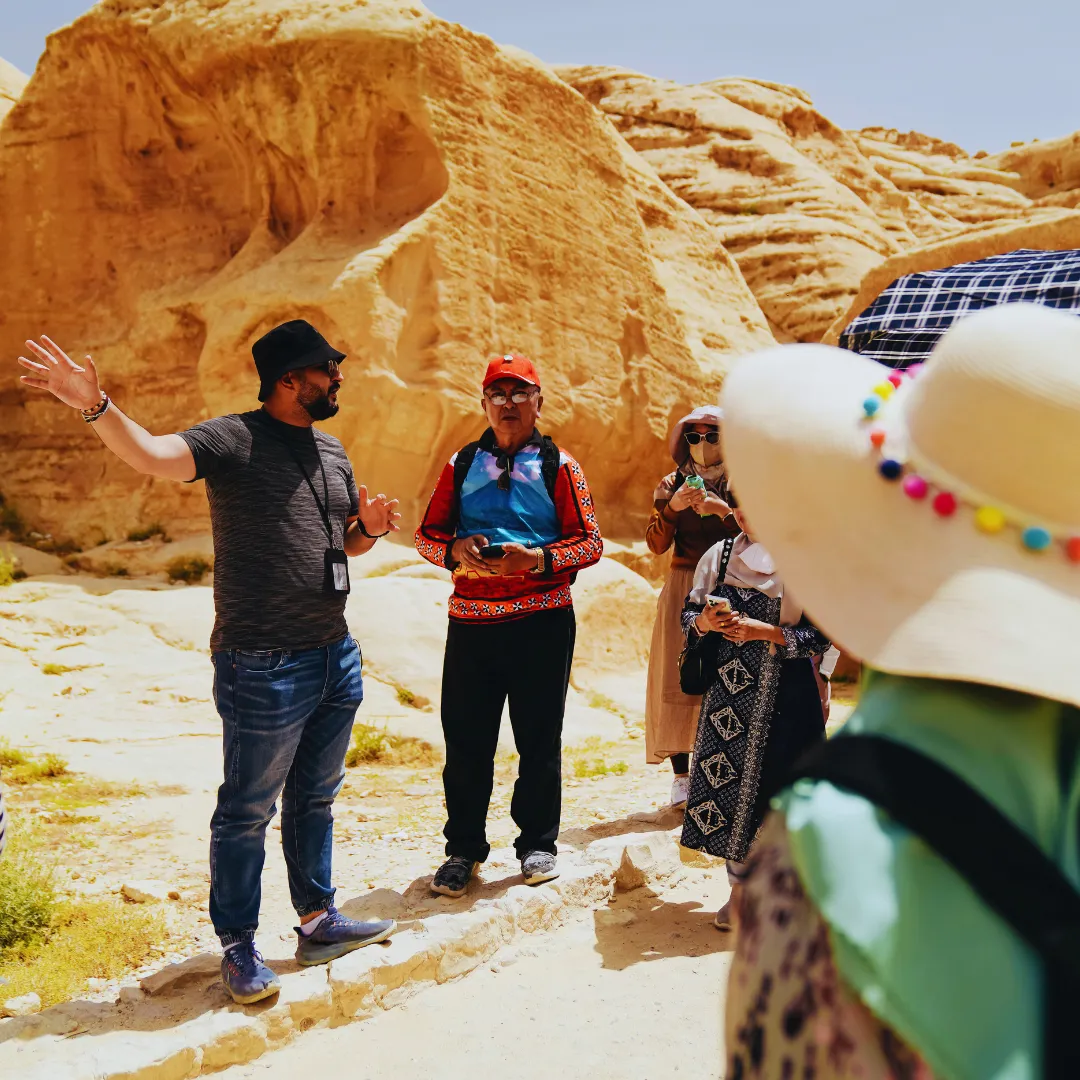 Professional tour guide leading tourists in Dubai